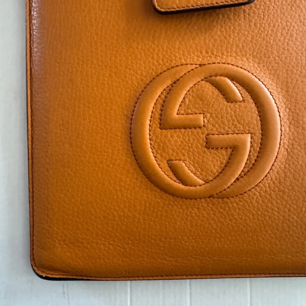 Gucci Orange Leather Sleeve